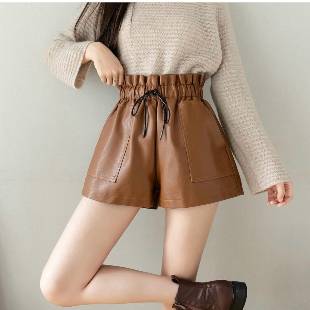 New with tags! Women’s faux leather brown shorts with pockets